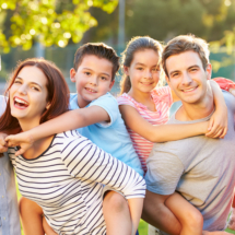 Outdoor Portrait Of Multi-Generation Family In Park Outdoor Portrait Of Multi-Generation Family In Park